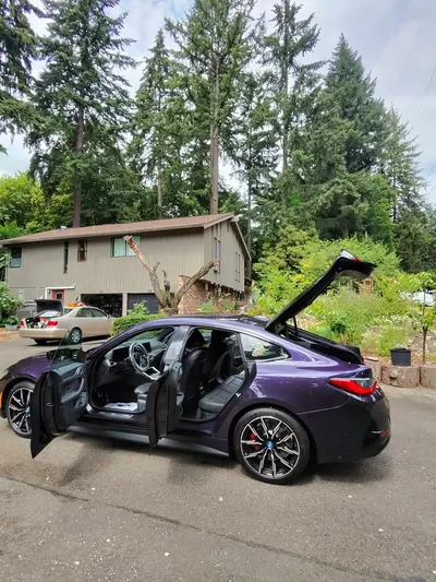 Master detailer applying ceramic coating on BMW in Issaquah, WA