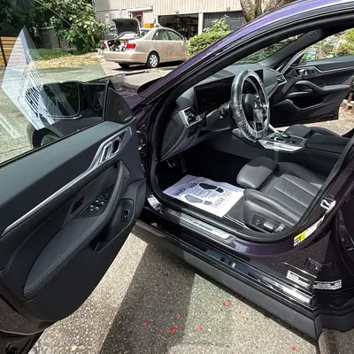 BMW M interior with cleaned leather sport seats and door panel